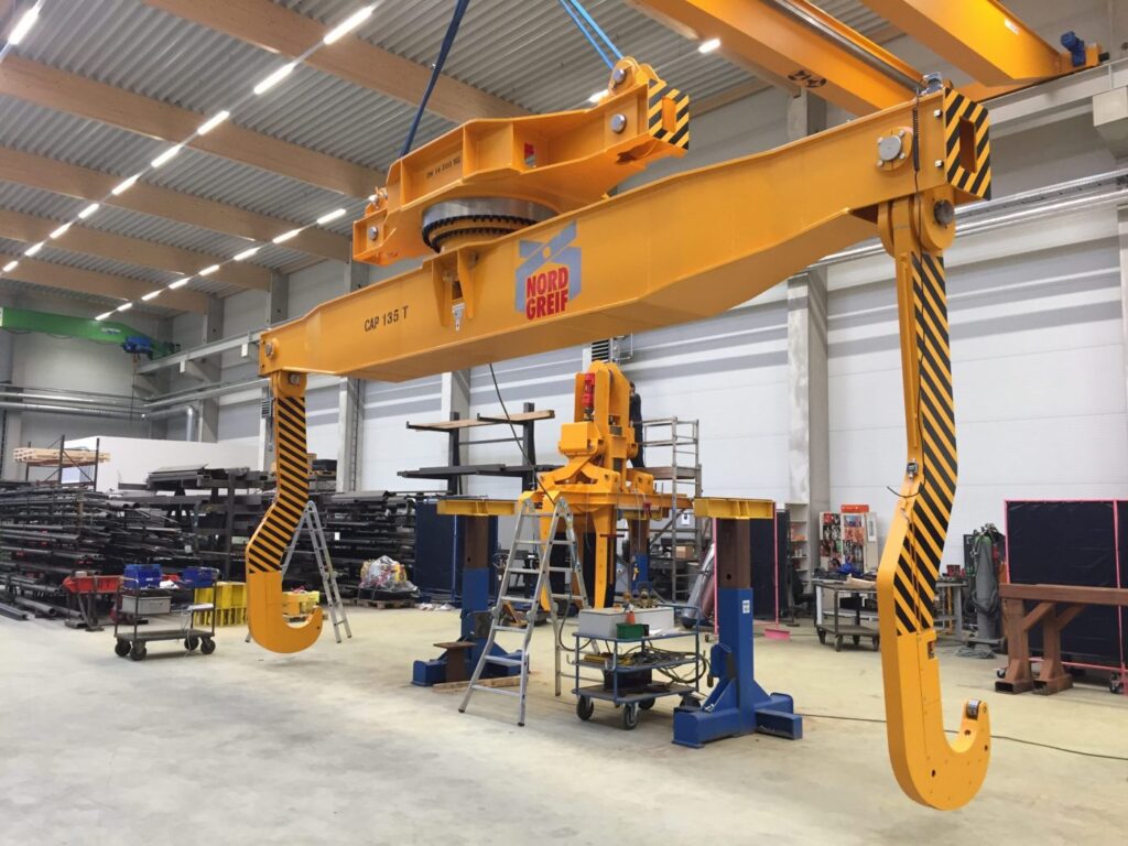 Long hook lifting beam, tambour lifting beam, hook spreader, long hook spreader beam, ladle beam, tambour lifting beam,ladlehook liftingbeam, ladlelifting beam, rotaringspreaderbeam, Lifting & Handling Equipment, lifting clamp, safety clamp, Lifting & Handling Equipment, LOAD HANDLING DEVICES